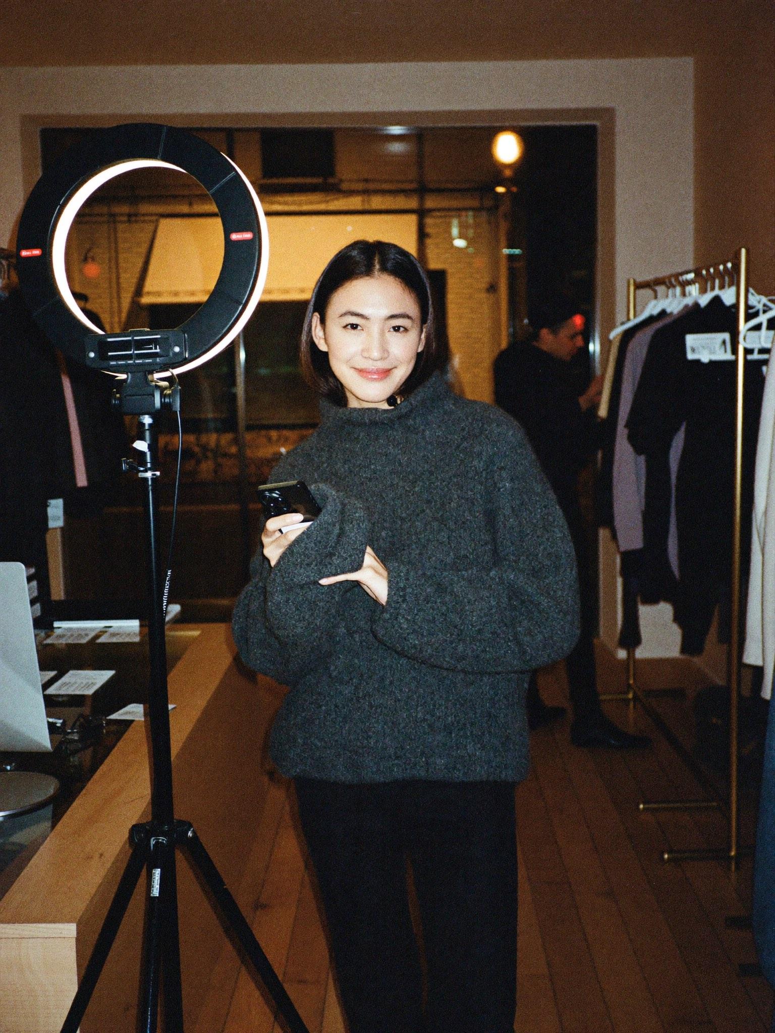 A host on camera in a Camp Hill shop on Market Street.