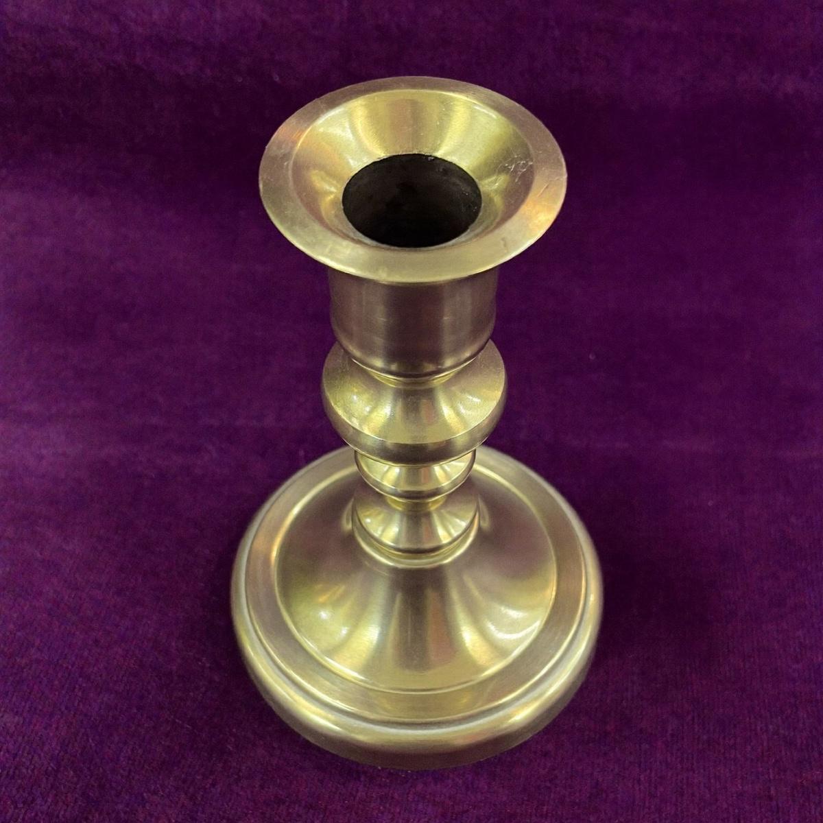 A brass candlestick.