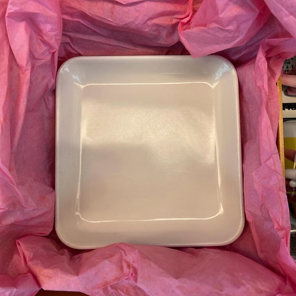 A small enamel trinket tray.