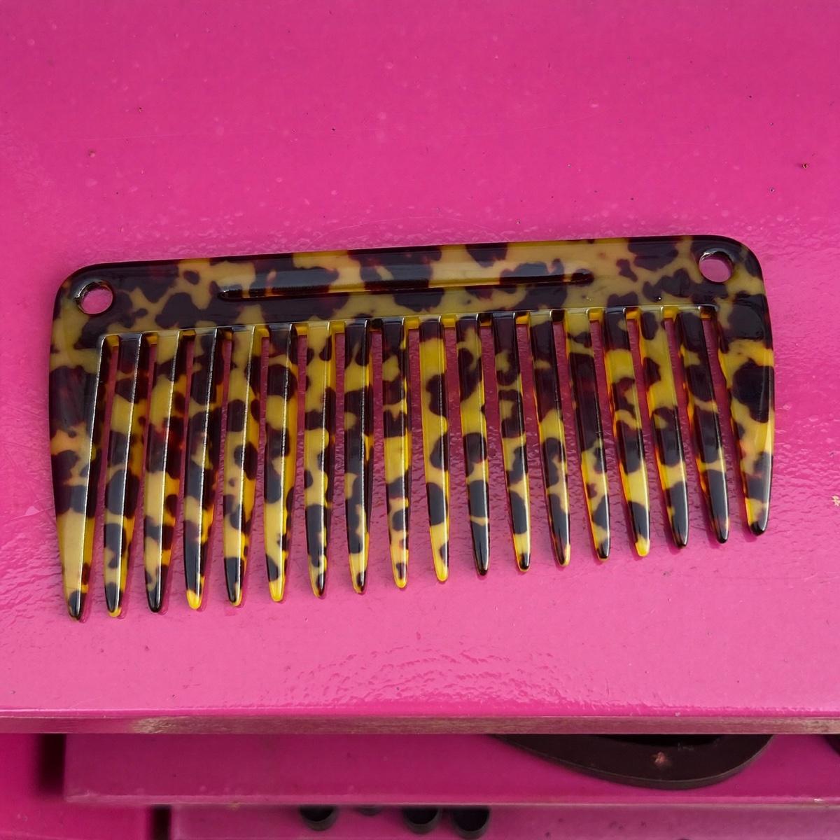 A tortoiseshell hair comb.