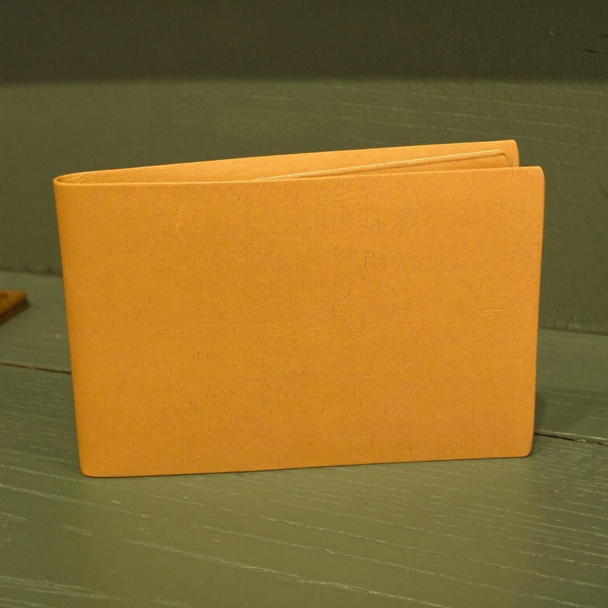 A slim leather wallet.