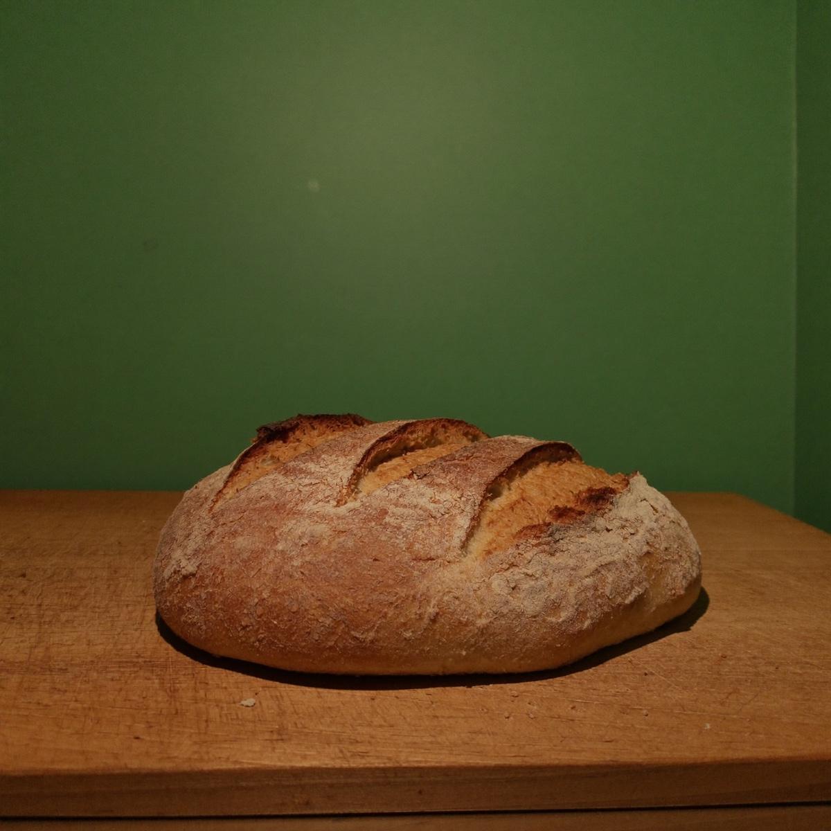 A scored sourdough loaf.