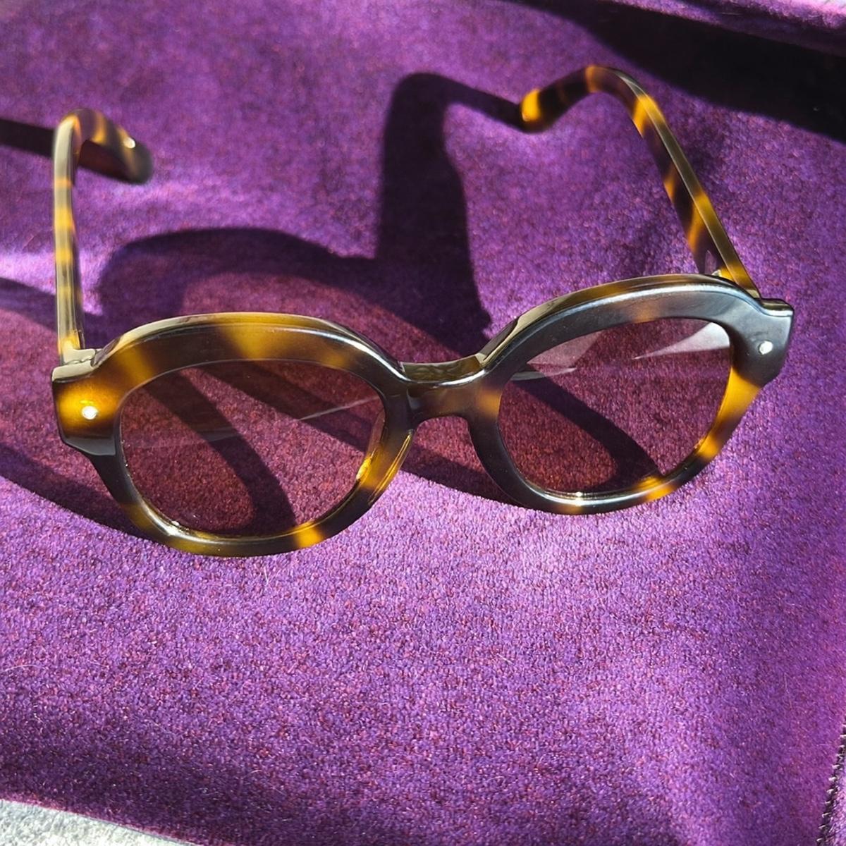 Tortoiseshell sunglasses.