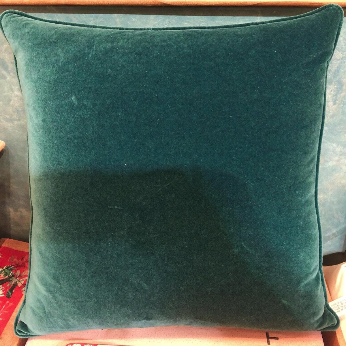 A linen throw pillow.